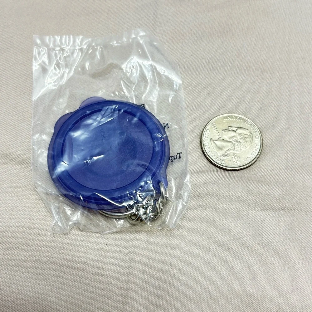 Tupperware Flat Out Keychain. Collectible and rare. Vintage
